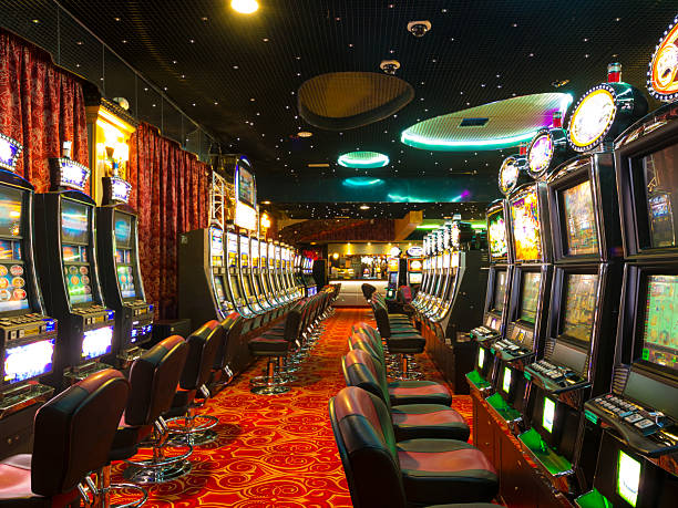 A Slot machines room in an empty Casino just before the opening time.